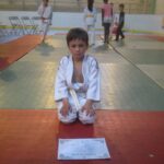 Simon, son diplôme et sa nouvelle ceinture